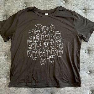 NWOT Women’s Large black printed with tee artistic faces